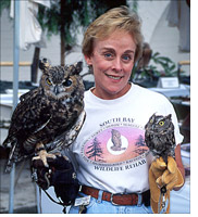Ann Lynch with two owls